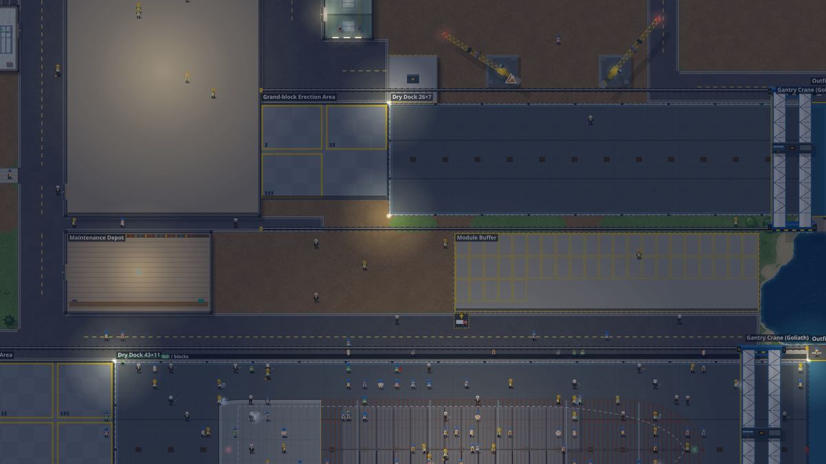 The shipyard at night with lit work areas